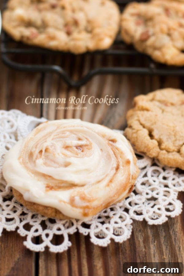 Cinnamon Roll Cookies: A delightful shortcut to cinnamon roll bliss. Delicious frosted cinnamon roll cookies on a cooling rack, promising the perfect blend of warmth and sweetness.