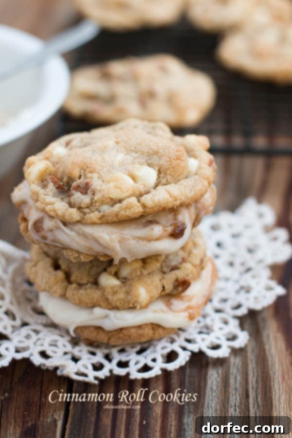 The perfect homemade cinnamon roll cookie: a quick and tasty alternative. Cinnamon roll cookies with a generous swirl of white frosting, ready to be enjoyed as a delightful, easy-to-make dessert.