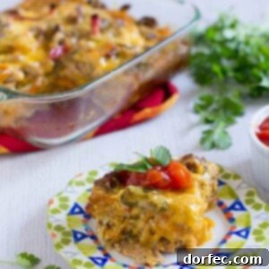 Morning Fiesta Enchiladas 3 A beautifully presented dish of Mexican Breakfast Enchiladas, ready to serve, highlighting the golden-brown melted cheese and vibrant fillings.