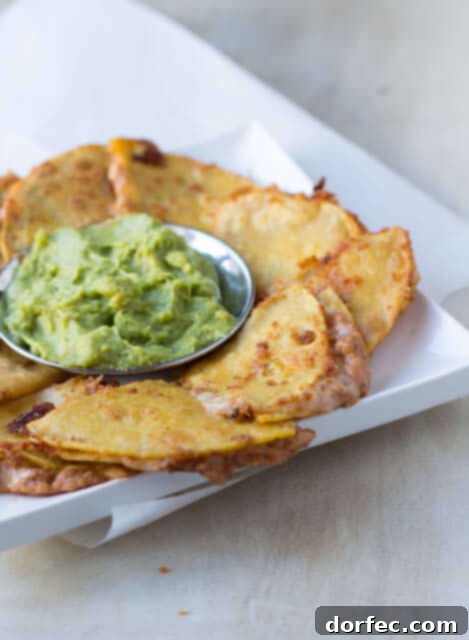Spicy Bean and Cheese Quesadillas with fresh guacamole for the perfect superbowl snack ohsweetbasil.com