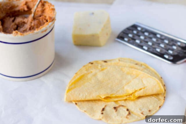 Spicy Bean and Cheese Quesadillas with fresh guacamole for the perfect superbowl snack ohsweetbasil.com