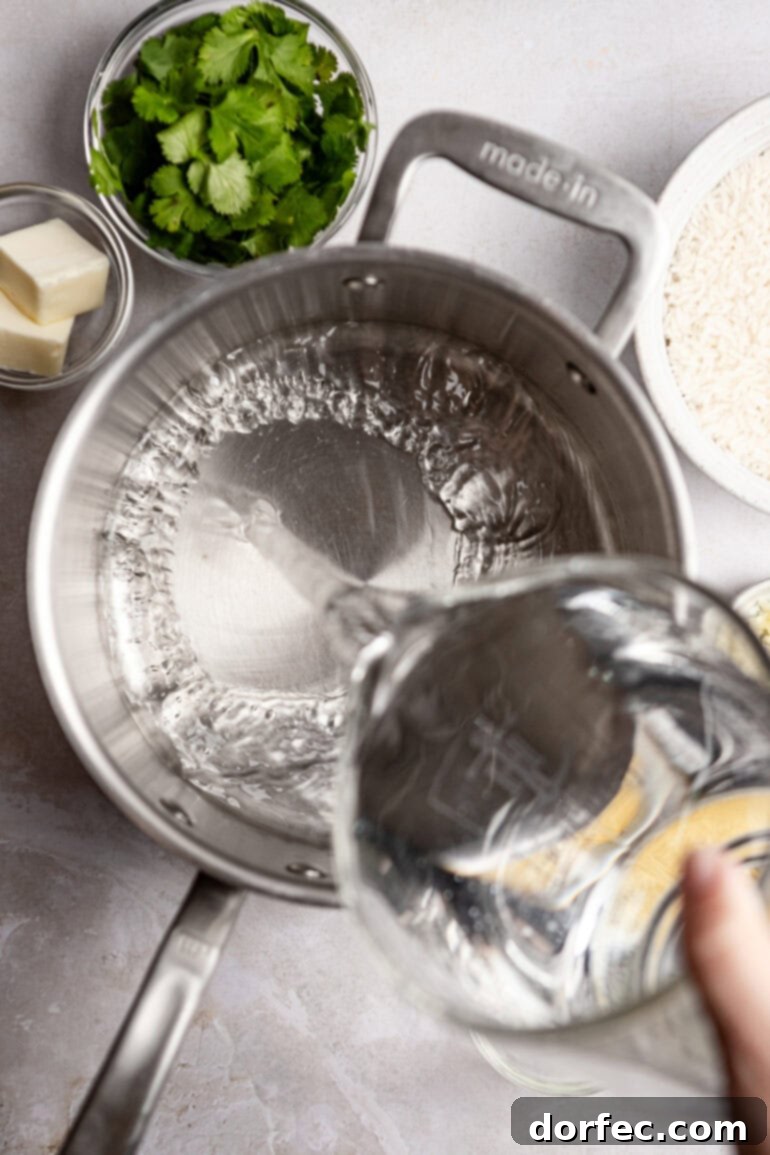 Step-by-step image of pouring water into a saucepan.