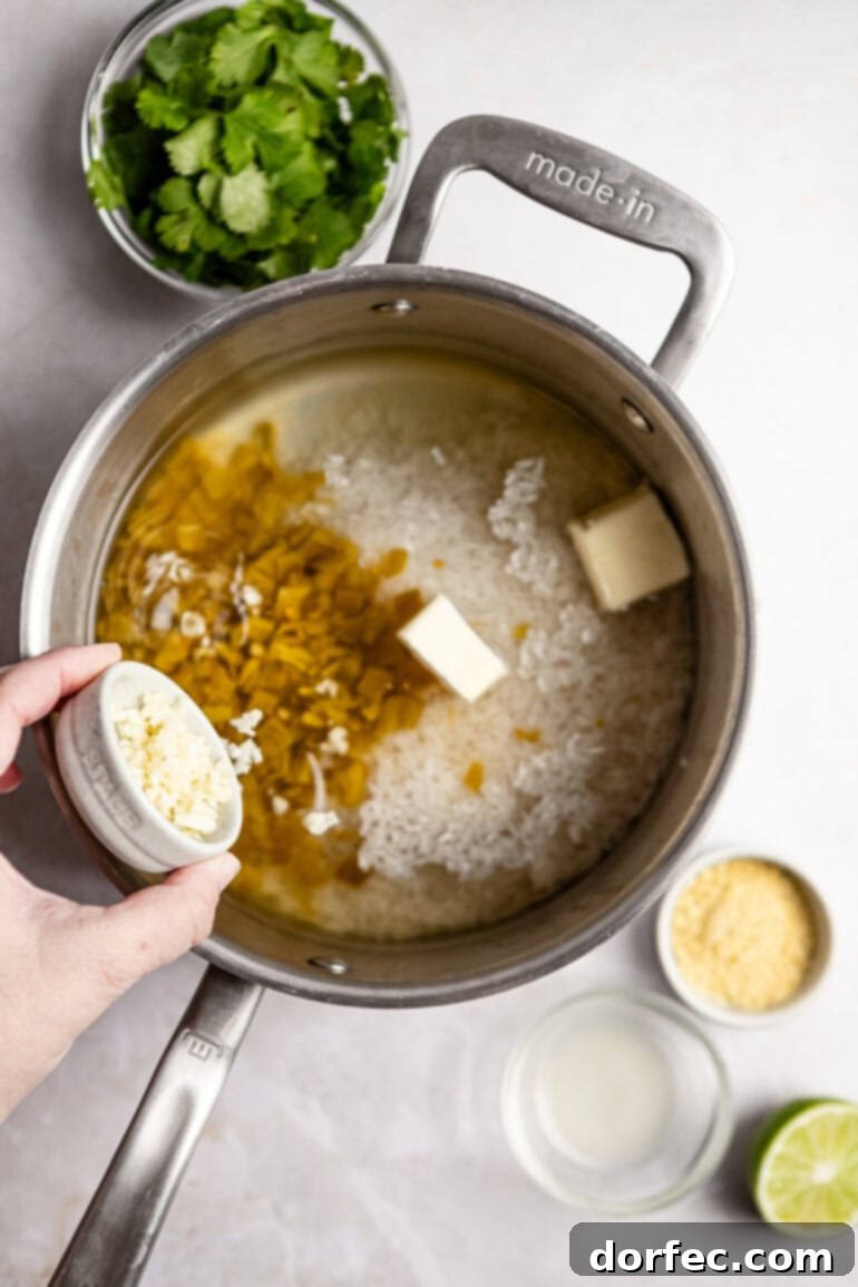 Step-by-step image of adding butter and chicken bouillon.