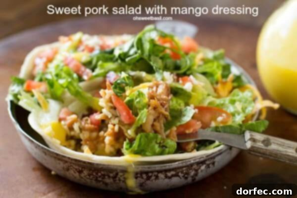 Sweet Pork salads stuffed with cilantro lime rice, beans and a killer mango dressing. ohsweetbasil.com Sweet Pork salads stuffed with cilantro lime rice, beans and a killer mango dressing. ohsweetbasil.com