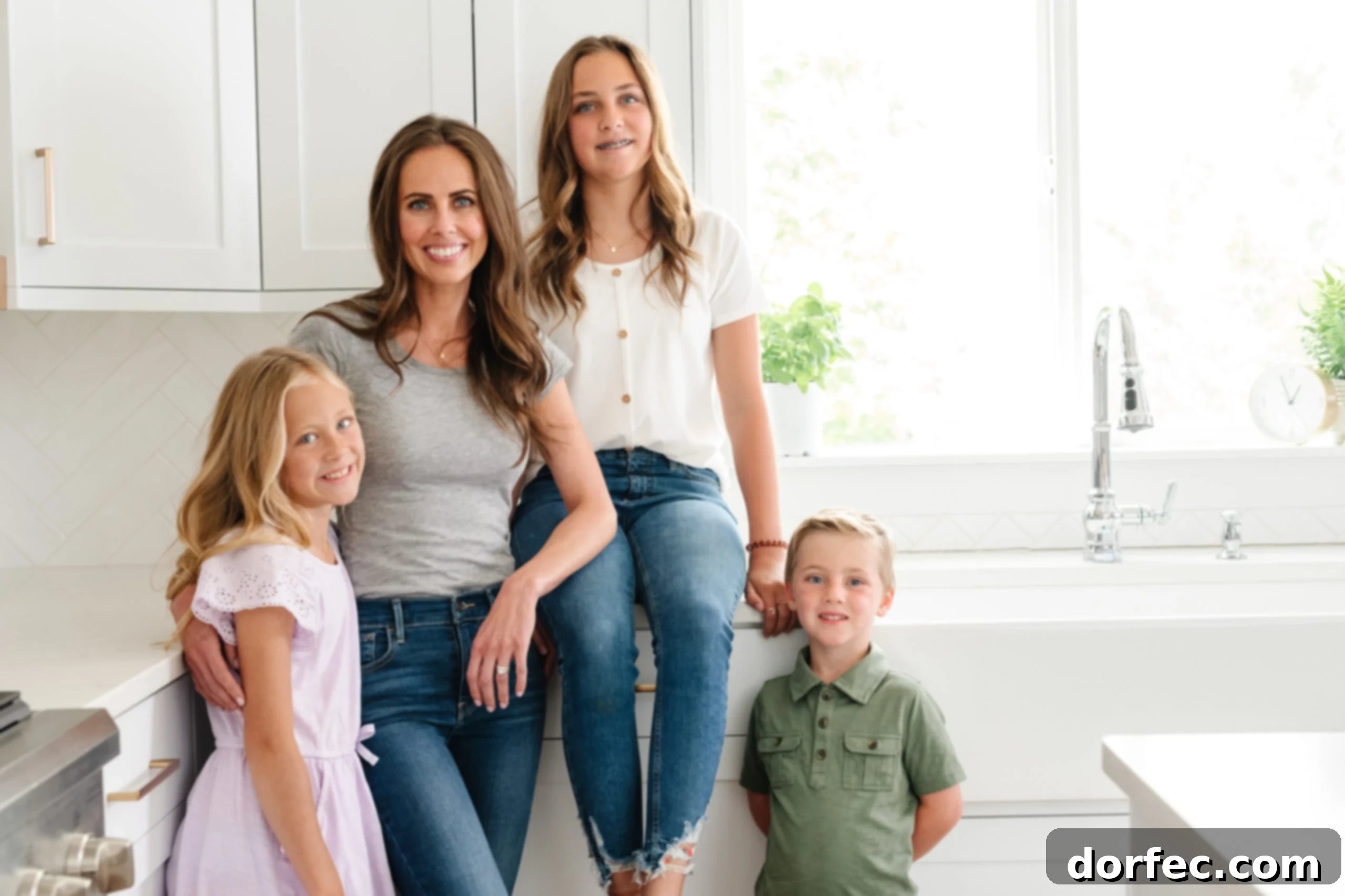 So Much Faith a photo of a mother with her three children in the kitchen