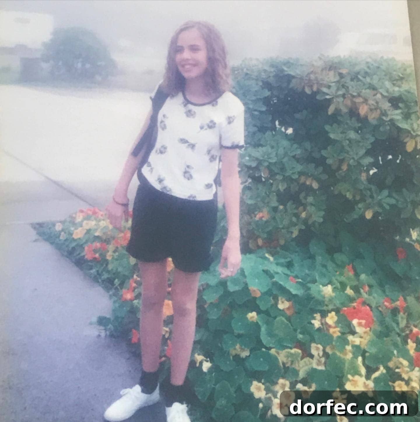 Turbulence a photo of a junior high school girl with a backpack strap over one shoulder