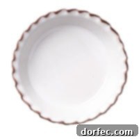 My favorite white ceramic pie plate I use in our kitchen from Jefferson Street Ceramics, perfect for elegant pie presentation.