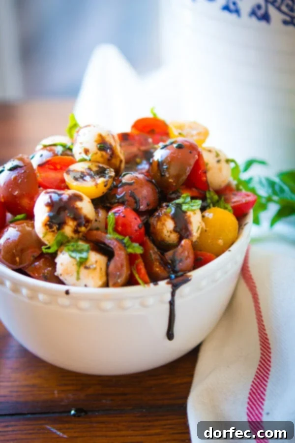This easy tomato mozzarella salad is so refreshing and perfect for a spring or summer side dish, plus you can make it a few different ways! ohsweetbasil.com