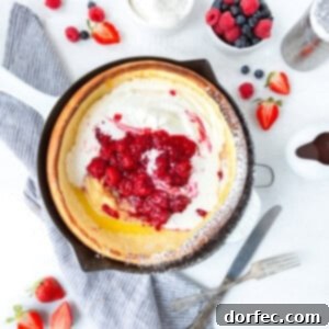 Giant Skillet Pancake Delight 2 A Dutch Baby Pancake baked in a cast iron skillet.
