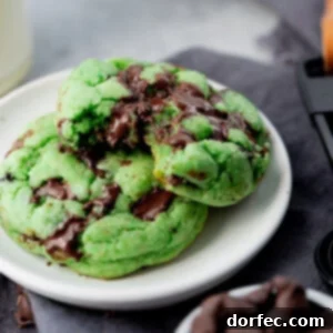 A perfectly baked green mint chocolate chip cookie.