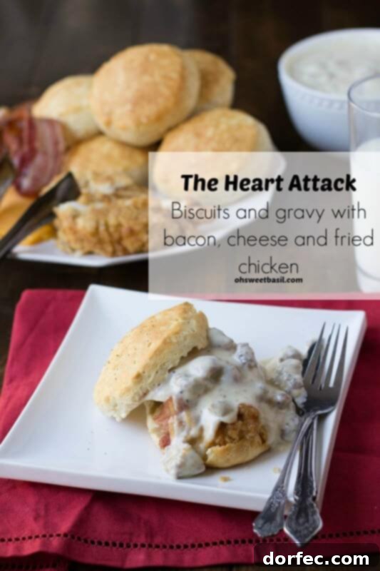 Rich, homemade sausage gravy served generously over fluffy biscuits, topped with crispy bacon, melted cheddar cheese, and tender fried chicken – the ultimate comfort food experience.