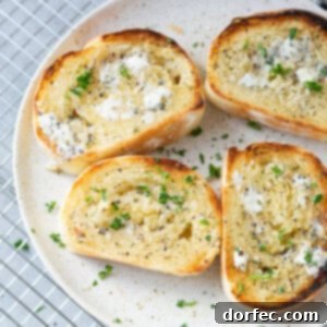 A delicious slice of golden-brown garlic bread