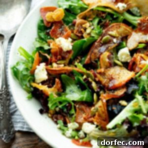 Autumn Roasted Pear and Apple Salad with Caramelized Shallot Maple Vinaigrette 2 A vibrant and appetizing Roasted Pear and Apple Salad with Caramelized Shallot Maple Vinaigrette.