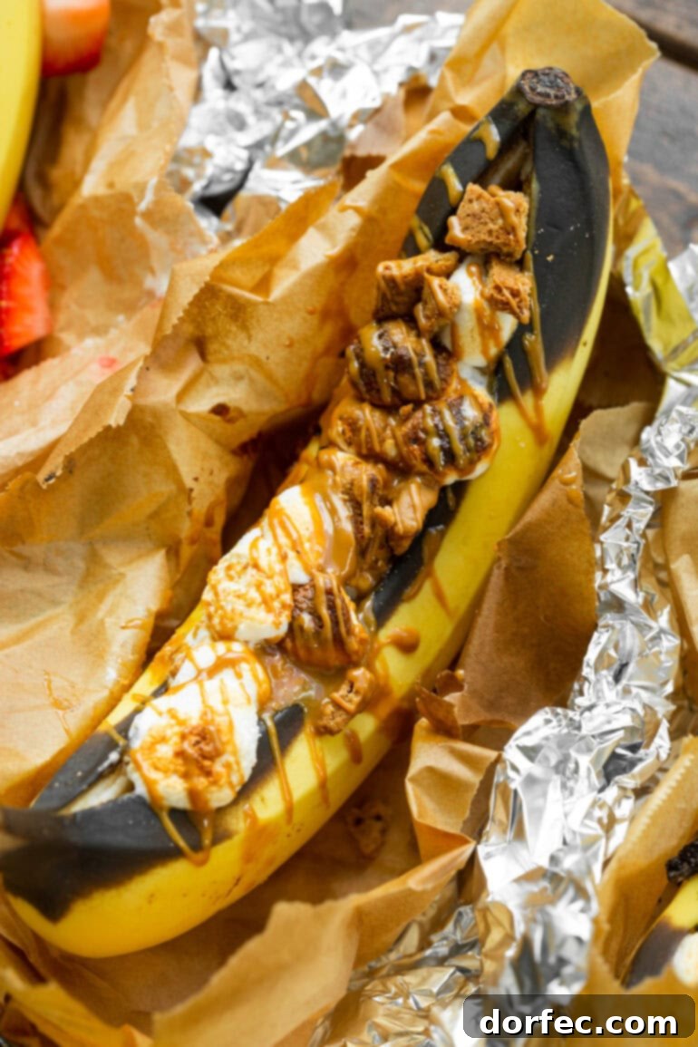 Our Favorite Campfire Banana Boats 9 A beautifully crafted banana boat, lavishly topped with crumbled Biscoff cookies and a generous drizzle of warm Biscoff butter spread.
