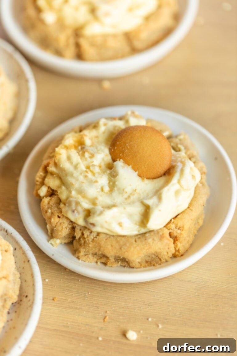 Giant Banana Cream Pie Cookies 6 a photo of a large banana cream pie cookie sitting on a small white dessert plate