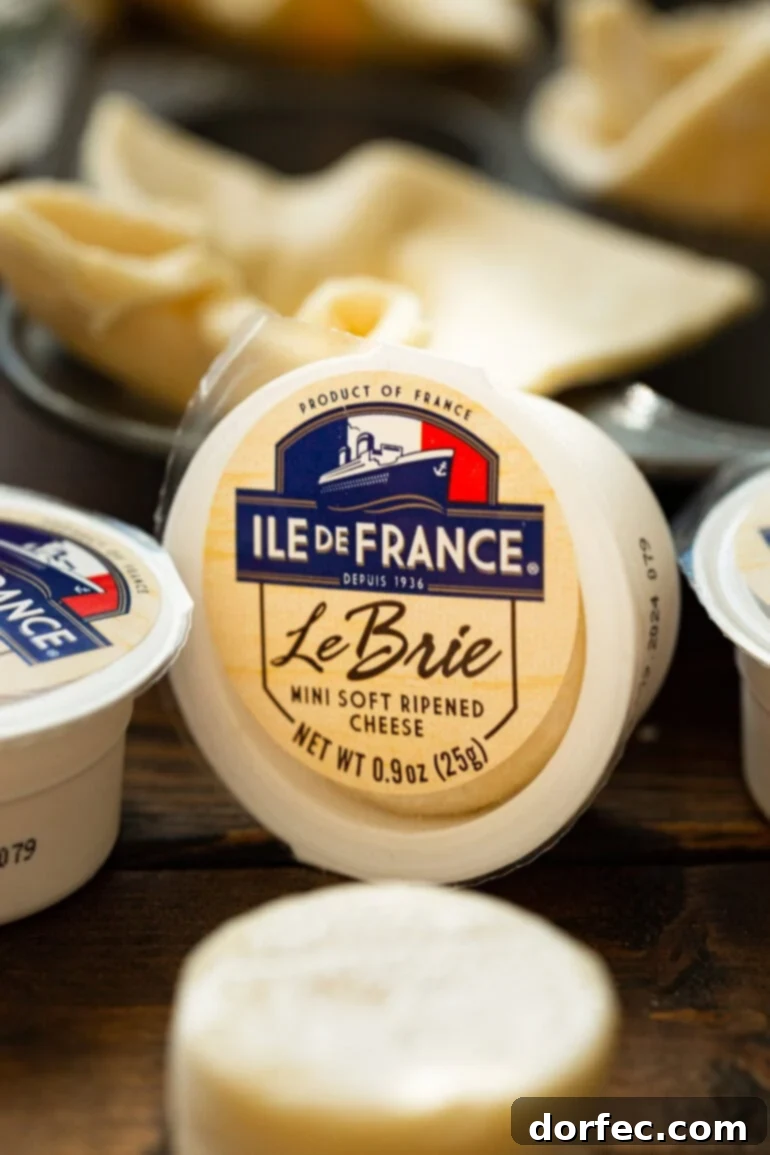A package of Ile de France Brie, illustrating the type of cheese recommended for the recipe.