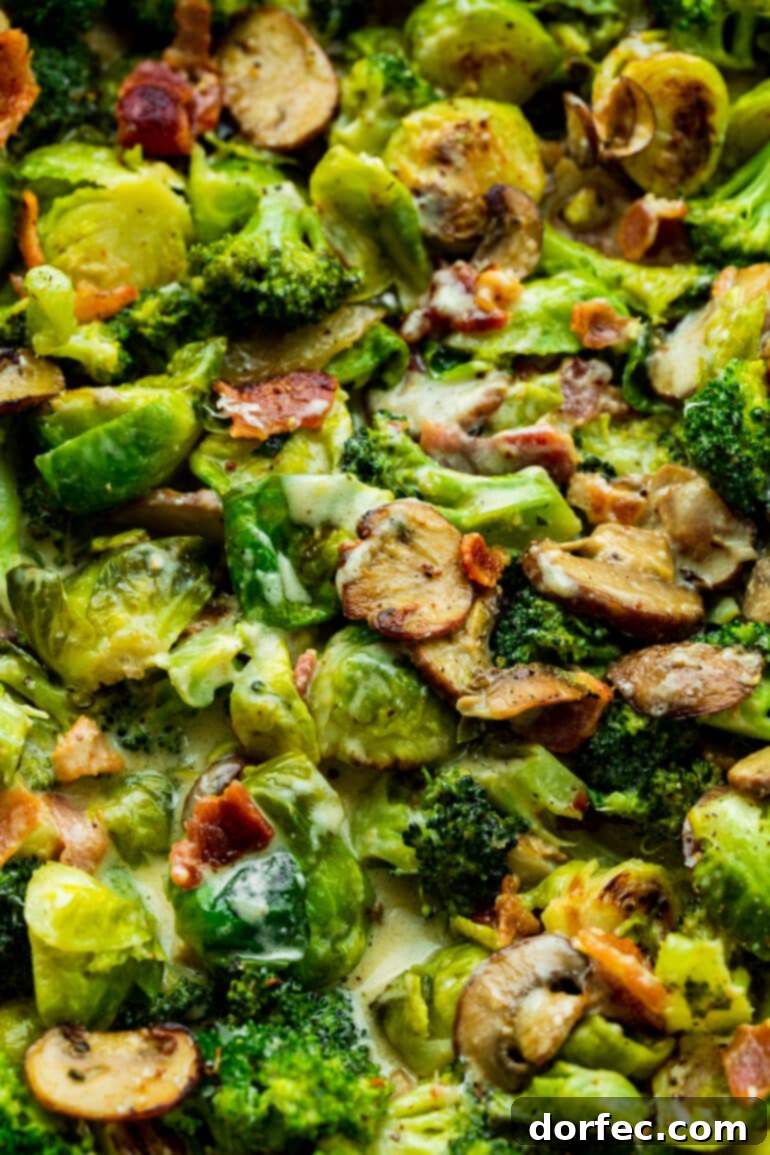 a photo of cooked brussel sprouts and broccoli with sliced mushrooms and crispy bacon bits in a saute pan