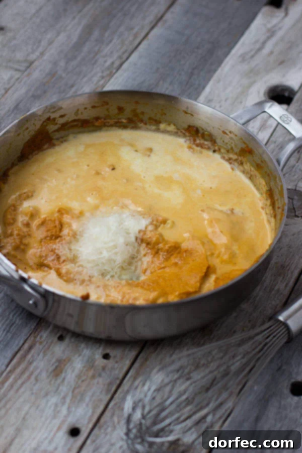 Creamy Pumpkin Pasta sauce with crunchy brown sugar pecans. You have to try to truly understand just how fantastic this pasta dish is! #fishernuts ohsweetbasil.com