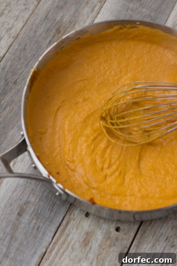 Creamy Pumpkin Pasta sauce with crunchy brown sugar pecans. You have to try to truly understand just how fantastic this pasta dish is! #fishernuts ohsweetbasil.com