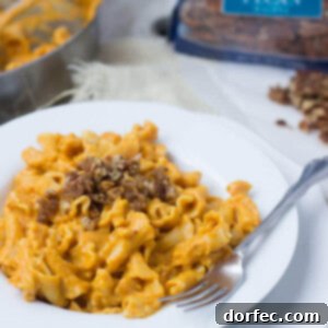 Creamy Pumpkin Pasta sauce with crunchy brown bugar pecans. You have to try to truly understand just how fantastic this pasta dish is! #fishernuts ohsweetbasil.com