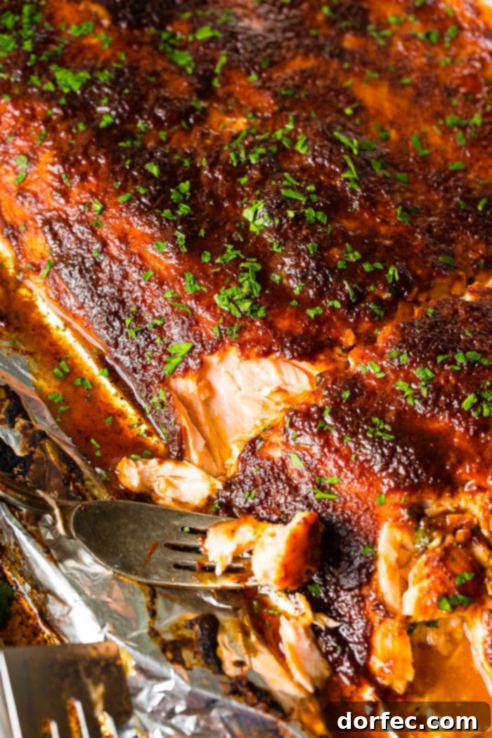 Perfectly baked Maple Glazed Salmon, featuring a beautiful golden crust, promising a healthy, flavorful, and incredibly easy-to-prepare meal.