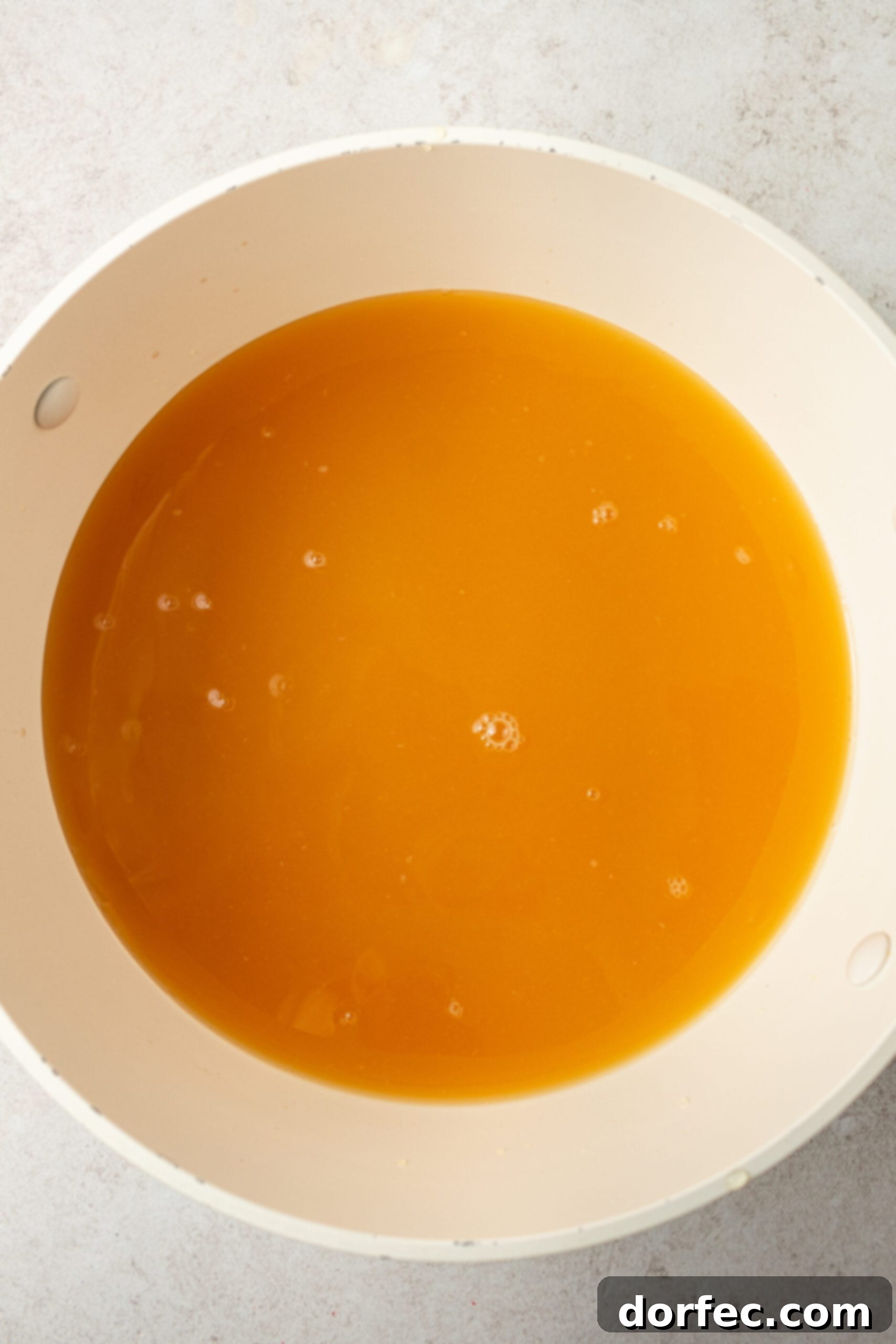 Step-by-step imagery of the Wassail making process, from simmering spices to adding juices and final warming. This visual guide helps ensure a perfect batch of homemade Wassail every time.
