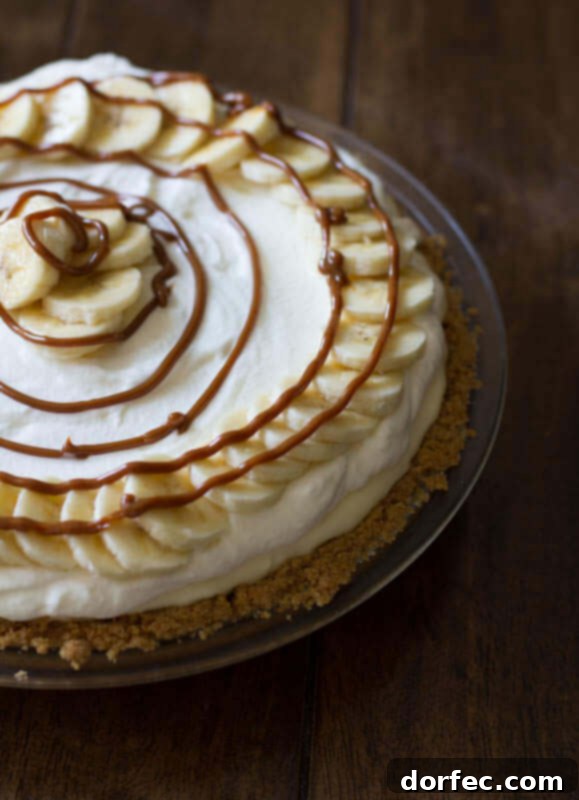 A stunning Dulce De Leche Banana Cream Pie, a creamy, sweet, and decadent dessert perfect for any celebration. OH. MY. SWEET. DELICIOUSNESS.