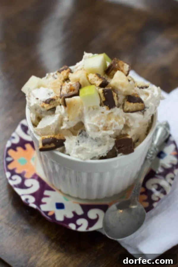 Cheesecake Snickers Salad: A Sweet and Creamy Dessert Revelation Decadent Cheesecake Snickers Salad with Crunchy Apples and Caramel