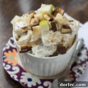 Delicious Cheesecake Snickers Salad with a creamy texture