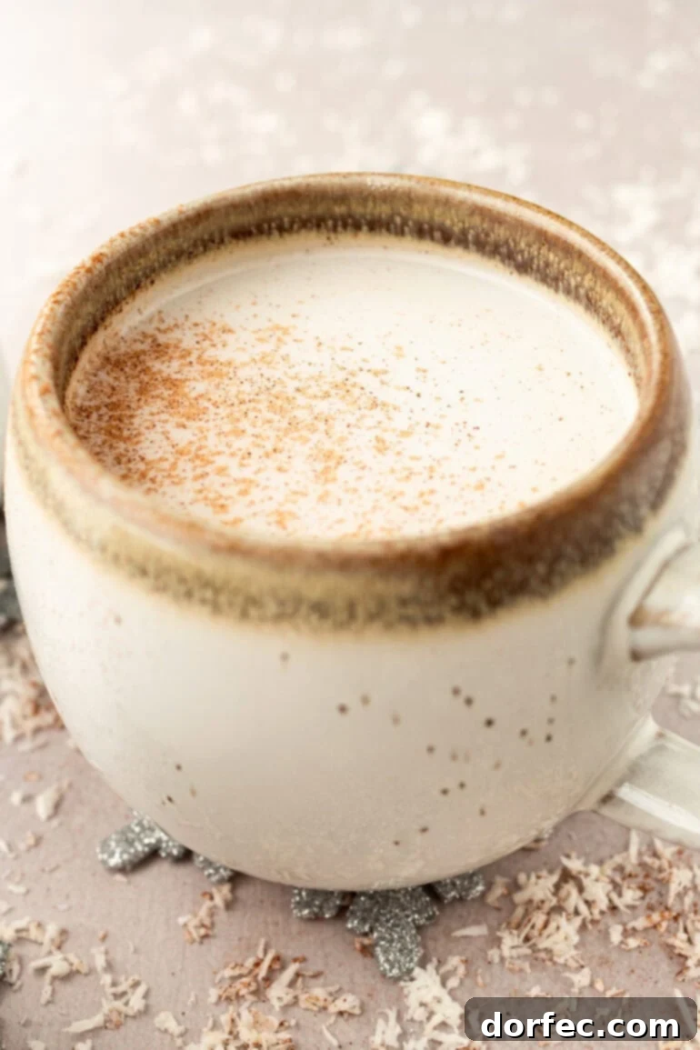 Snowman Soup: A Cozy Vanilla Milk Holiday Treat 2 Mug of Warm Vanilla Milk with Cinnamon