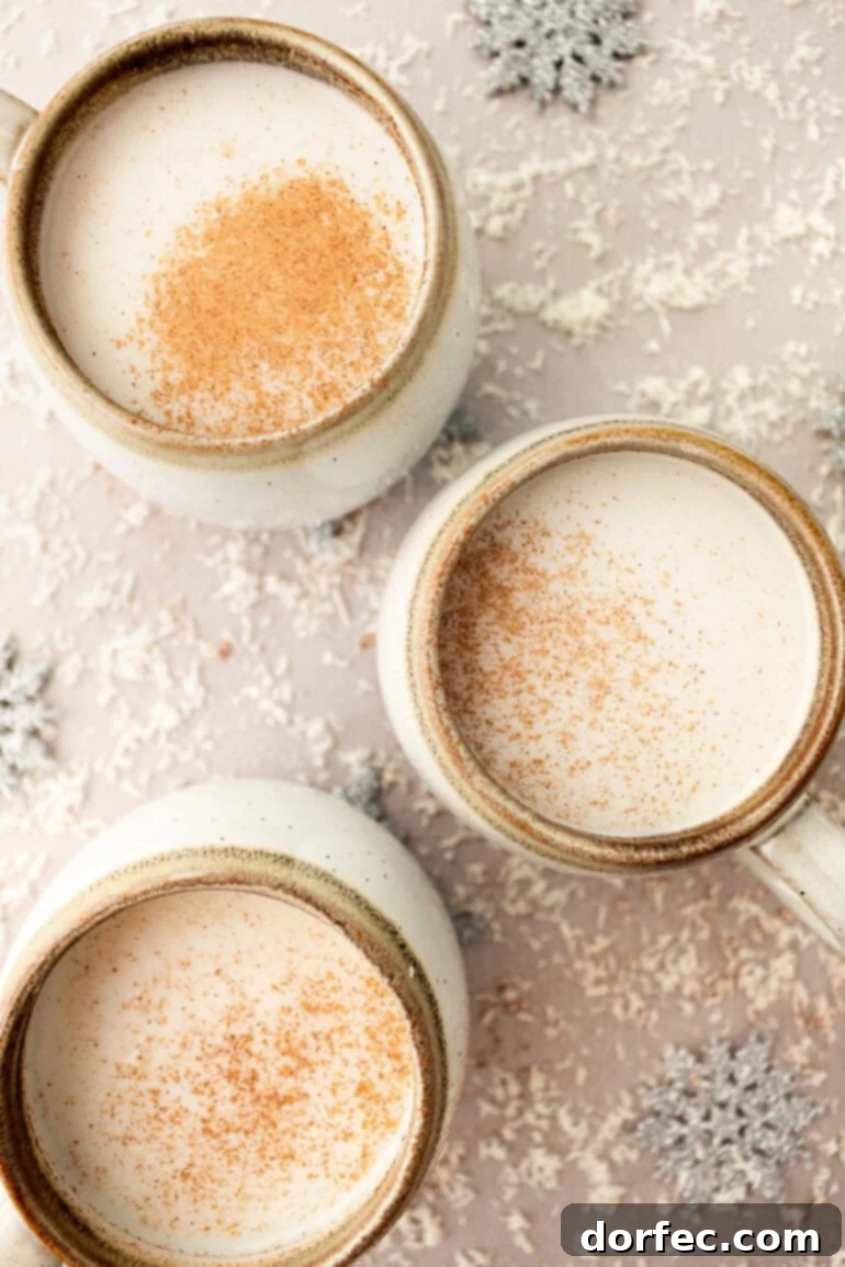 Snowman Soup: A Cozy Vanilla Milk Holiday Treat 8 Mugs of Warm Vanilla Milk with Whipped Cream and Cinnamon