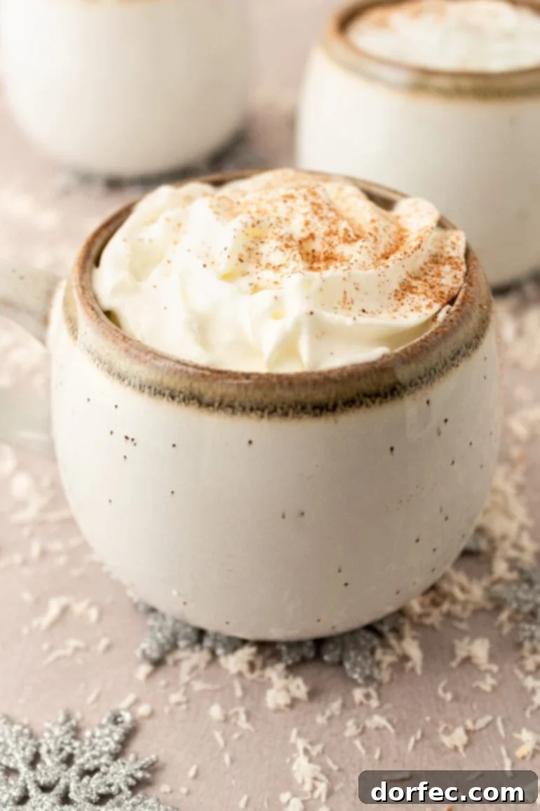 Snowman Soup: A Cozy Vanilla Milk Holiday Treat 9 Mug of Warm Vanilla Milk with Whipped Cream and Cookies