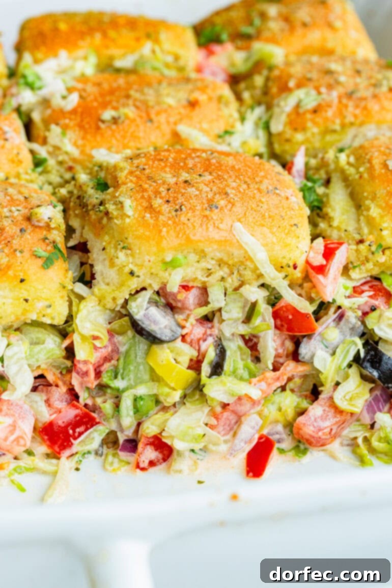 Baking dish of baked Italian sliders