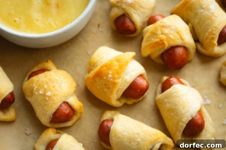 Baked pigs in a blanket with salt sprinkles
