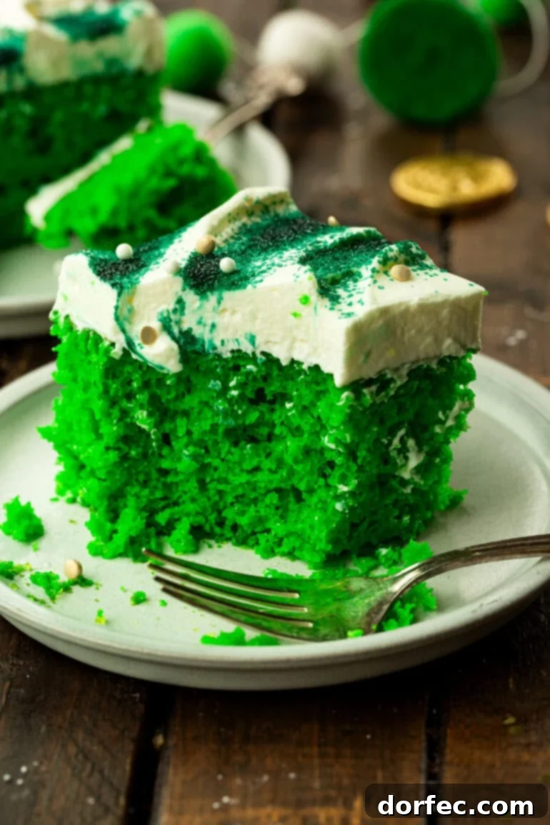 Shamrock Jello Poke Cake: A St. Patrick's Day Treat 2 Lime Jello Poke Cake with Cream Cheese Frosting and Green Sprinkles