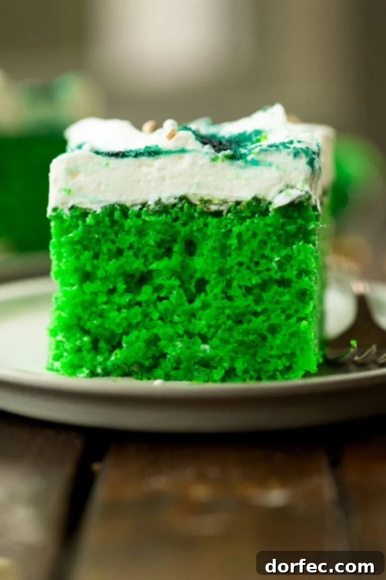 Shamrock Jello Poke Cake: A St. Patrick's Day Treat 6 Fluffy Green Lime Jello Poke Cake with Sprinkles