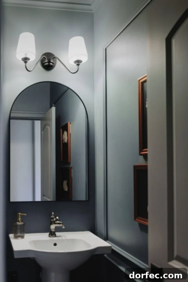 A black arched mirror complements the color scheme.