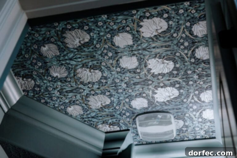 Wallpapered ceiling in a color drenched space.