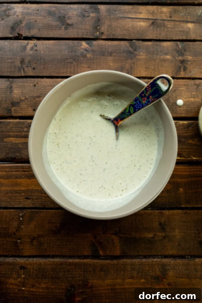 Homemade Chicken Cream Soup 4 Bowl of homemade cream of chicken soup with serving spoon