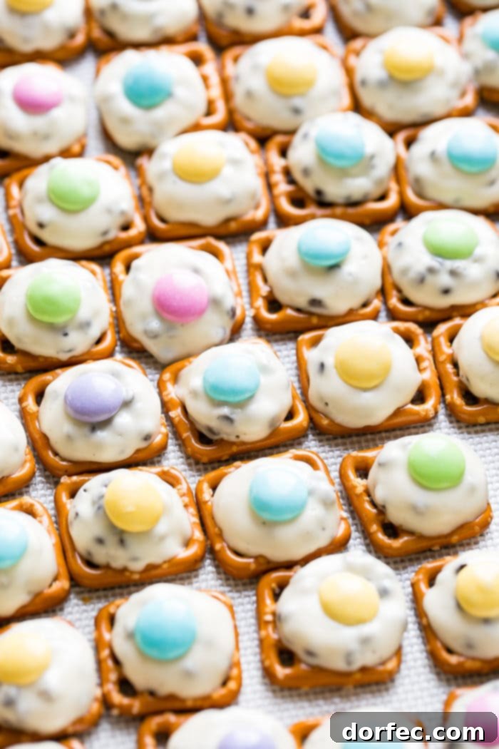 Easter Kiss Pretzel Bites 4 Hershey Kiss Pretzels on a Baking Sheet