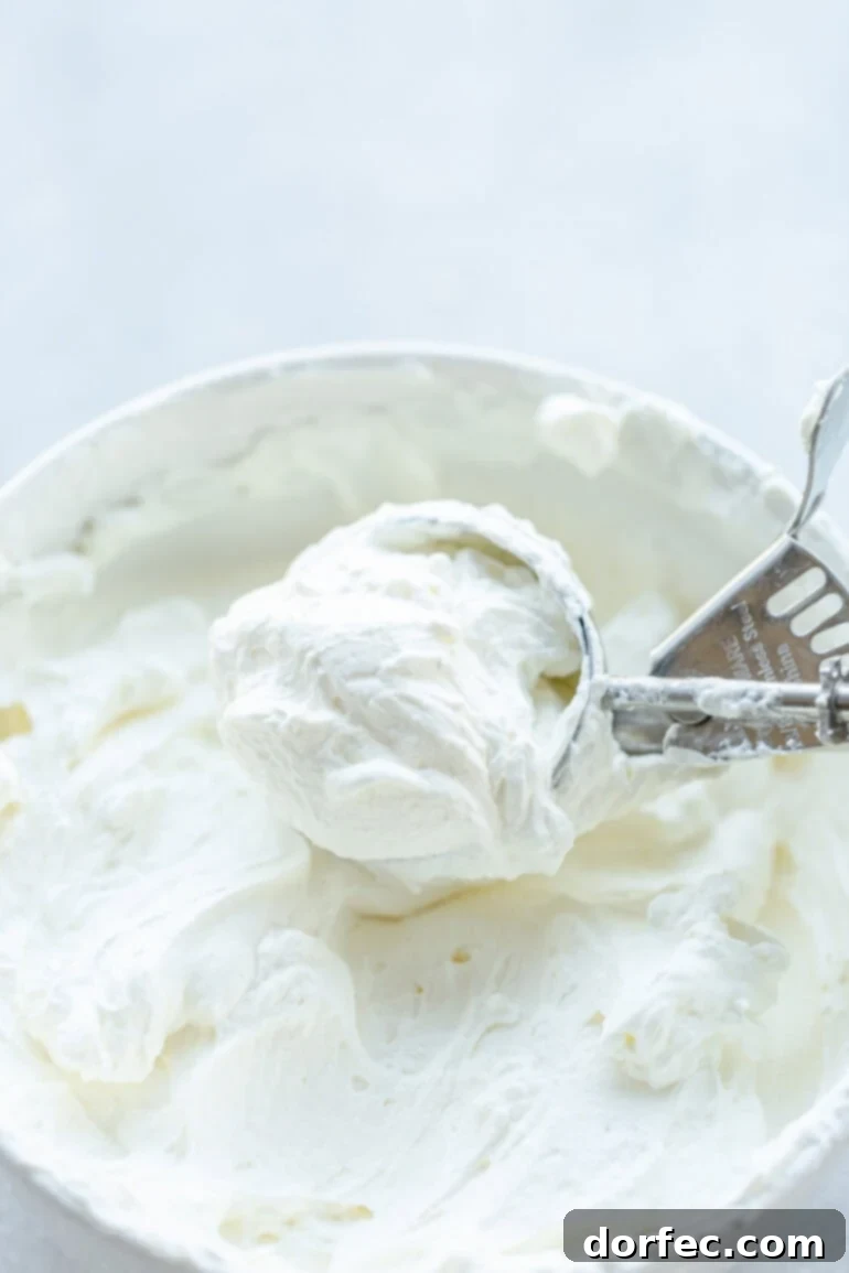 Mascarpone Dream Cream 4 Mascarpone whipped cream being scooped