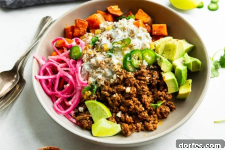 Street corn ground beef bowl with avocado and pickled red onions