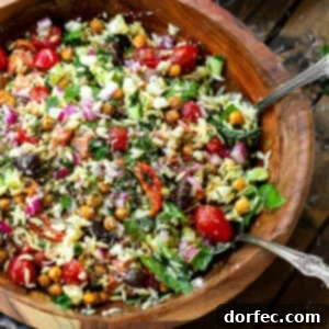 Crowd Pleasing Pasta Salads Made Easy for Potlucks 11 Elegant Greek Orzo Pasta Salad with fresh herbs and feta cheese.