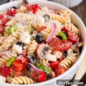 Crowd Pleasing Pasta Salads Made Easy for Potlucks 13 Fun Pizza Pasta Salad with pepperoni, mozzarella, and black olives.