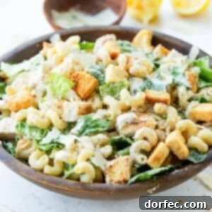 Crowd Pleasing Pasta Salads Made Easy for Potlucks 16 Chicken Caesar Pasta Salad with grilled chicken and crunchy croutons.