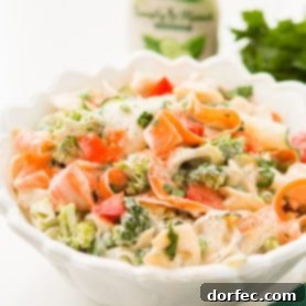 Crowd Pleasing Pasta Salads Made Easy for Potlucks 5 Colorful tortellini pasta salad with fresh vegetable ribbons and ranch dressing.