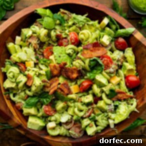 Crowd Pleasing Pasta Salads Made Easy for Potlucks 7 BLT Pasta Salad with crispy bacon, juicy tomatoes, and a creamy dressing.