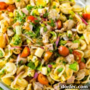 Crowd Pleasing Pasta Salads Made Easy for Potlucks 10 Cuban Pasta Salad with ham, pickles, and a citrusy mojo dressing.