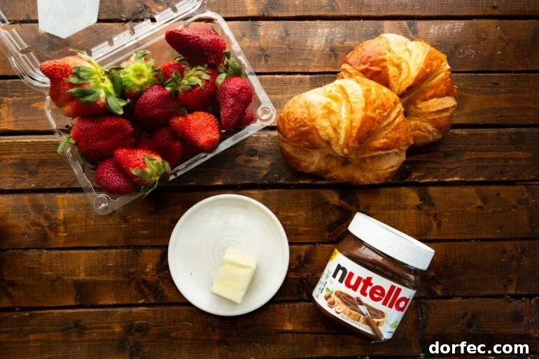 Grilled Croissants with Strawberry and Nutella Filling 4 Ingredients for Strawberry Nutella Croissants including strawberries, croissants, butter, and nutella