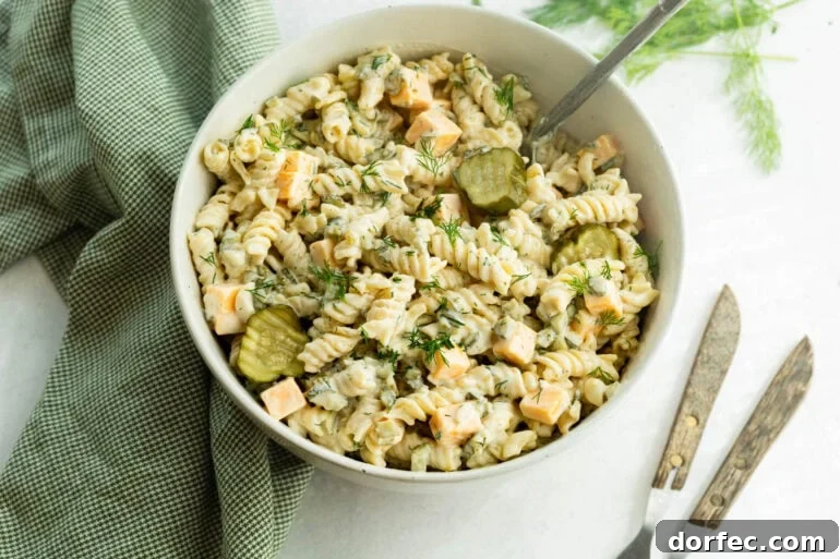A creamy cold noodle dish with pickled cucumbers
